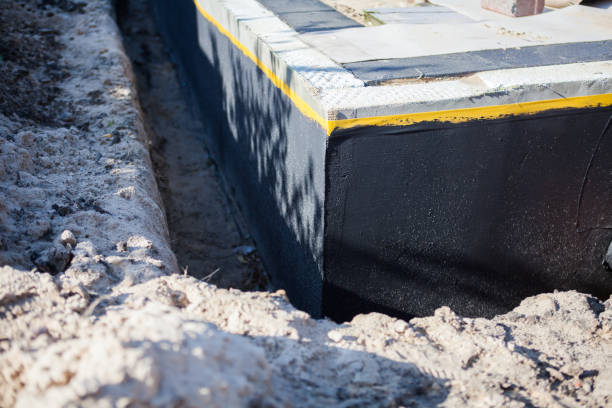 Professional Waterproofing technician working in Clarksville, IN